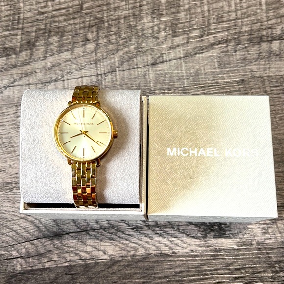 Michael Kors Jewelry - Michael Kors never been worn gold watch
